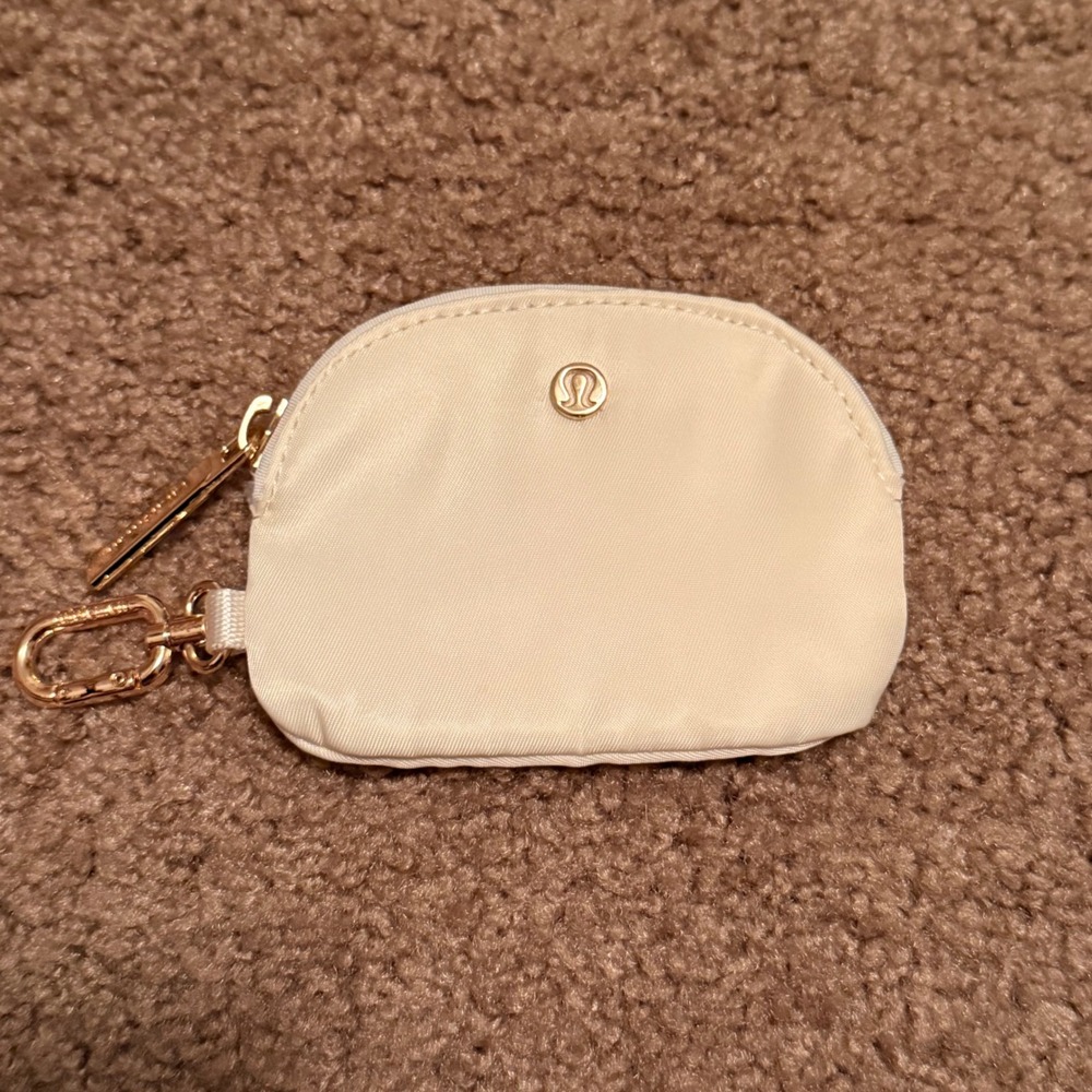 Lululemon Pouch Wristlet Coin Purse Cream Gold Logo Carabiner Clip Charm